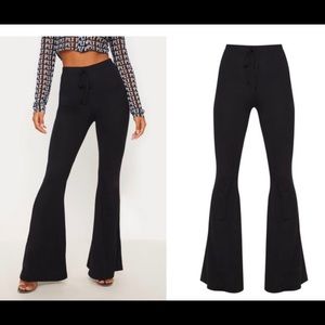 Black cotton drawstring flared pant